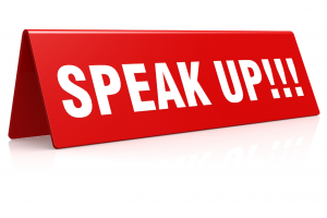 sign with the words "speak up"